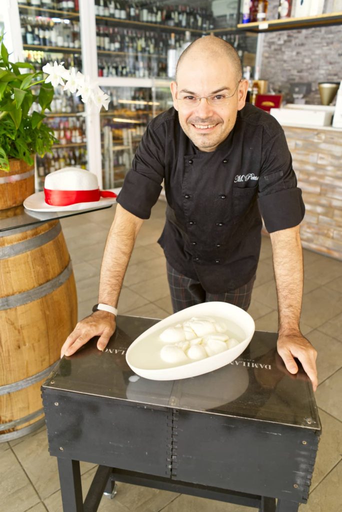 Chef Massimo Pettinau presenting fresh mozzarella